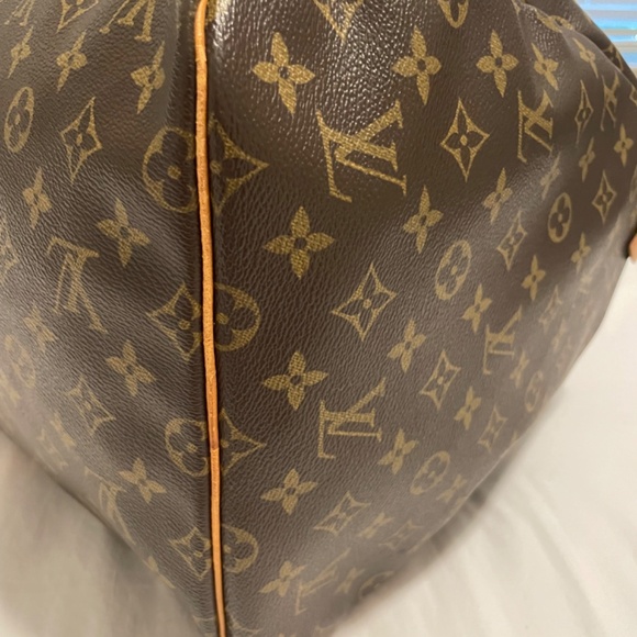 Louis Vuitton keepall 55 duffle - Picture 9 of 14